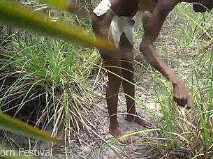 skinny ebony african with narrow ass works outdoors in heat