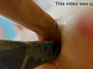 Two Tattooed Goth Babes Fist and Finger Friend's Gaping Asshole Double Penetration