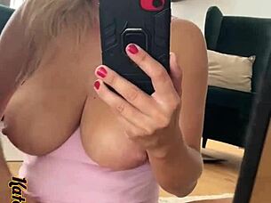 mirror selfie teases nipples in lingerie and socks
