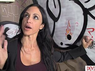 Stepmom and young woman slurp huge cock in public toilet