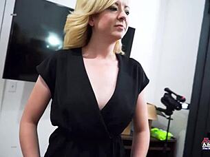 Hey, watch this busty blonde milf suck cock while fingering her wet ass!