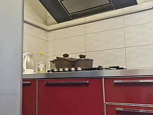 Sexy tattooed ass shakes while cleaning stove gets hot