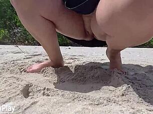 juicy bbw wife drips wet peeing under public beach skirt