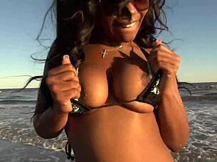 ebony fat ass dances naked on public beach 🍑🏖️