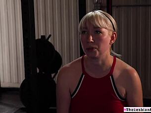 busty babe gets fingered hard by fitness instructor milf
