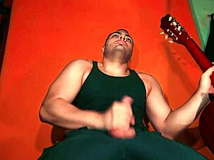 sexy chinese bodybuilder rubs spanish guitar on monster cock carrot background! 🎸🍆
