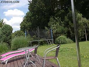 She teases garden breeze under short skirt