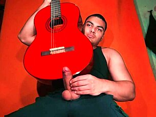 sexy chinese bodybuilder rubs spanish guitar on monster cock carrot background! 🎸🍆