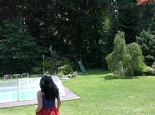 She teases garden breeze under short skirt