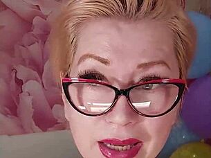 mature slut rams huge dildo deep into juicy pussy amid colorful balloons squirting wildly