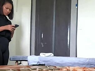 Young masseuse grips cock for explosive handjob climax