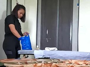 Young masseuse grips cock for explosive handjob climax
