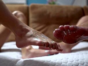 Hey cuties, shiny legs wrapped around huge rubber cock for steamy footjob fun!