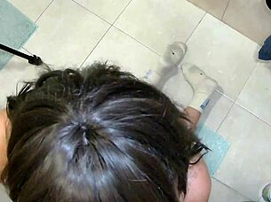 a hotwife in bathroom double blowjob sucking two cocks for cuckold husband pov