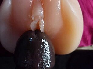 oiled big black dildo pounds fuck doll slow motion closeup