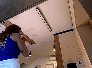 redhead wife flaunts miniskirt and pink panties strip