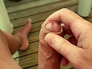 camping exhibitionist strokes massive cock outdoors near climax