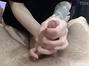 oiled masseuse milks my throbbing cock with expert handjob strokes