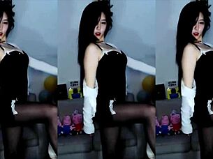 sexy chinese girl dances provocatively on stage