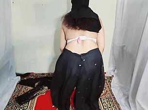 arabic hijab slut shakes big tits and ass erotically to music at home