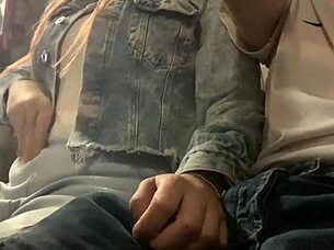 Bus slut grabs my cock and strokes it publicly