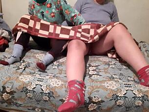 Mutual masturbation under covers while parents watch movie nearby