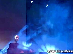 Seductive Brunette Tempts in Ripped Red Lingerie for Outdoor Striptease Thrills