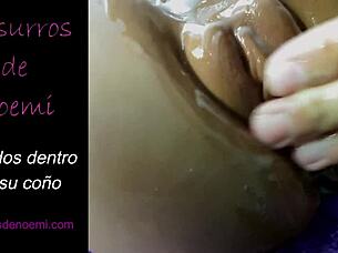 She pushes four fingers deep into her eager pussy for intense pleasure