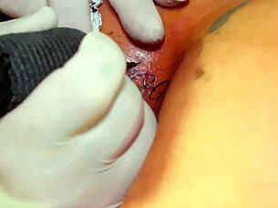 we tattooed whore's tight ass hole while tattooist fucks it 😈🍑💉