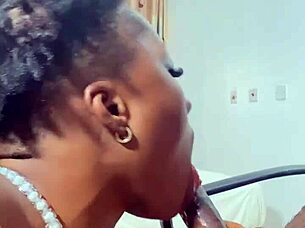 naija babe candy slurps my big black cock like a pro blowjob queen