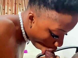 naija babe candy slurps my big black cock like a pro blowjob queen