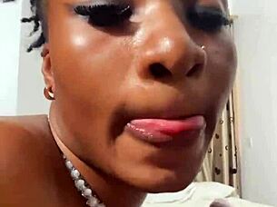 naija babe candy slurps my big black cock like a pro blowjob queen