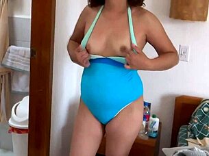 mature blonde milf masturbates wildly on beach eyeing bikini-clad temptress