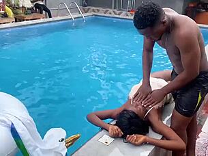 Young ebony beauty rewards pool hero with wild interracial sex