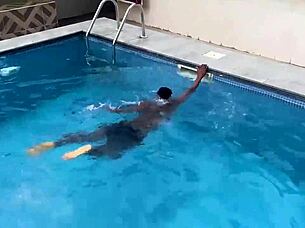 Young ebony beauty rewards pool hero with wild interracial sex