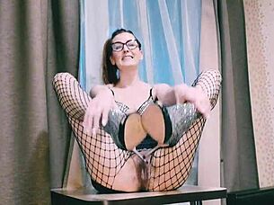 hey auntie in glasses fishnets teases her big clit hairy pussy for you dirty talk