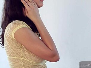 dark haired cutie gropes shaved tits in mirror sensually