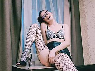 hey auntie in glasses fishnets teases her big clit hairy pussy for you dirty talk