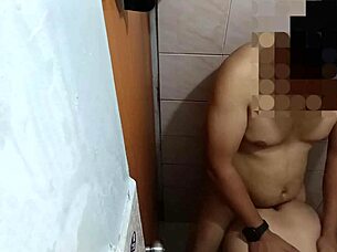 Asian babe surrenders to bathroom pounding passion