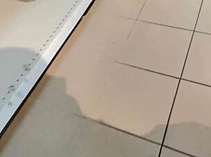 Italian woman flashes ass and bushy pussy in store changing room
