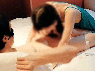 sexy slim wife in green lingerie handjobs hubby to cum!