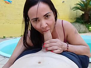 Brazilian milf flashes big clit pussy poolside with step guy
