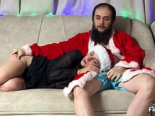 Milf tempts guy sharing Christmas couch for taboo sofa fun