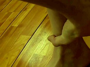 Fifi Foxx's teasing handjob grips against the wall