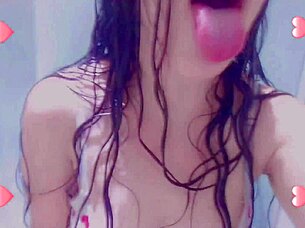 wet horny student showers while fingering her natural tits