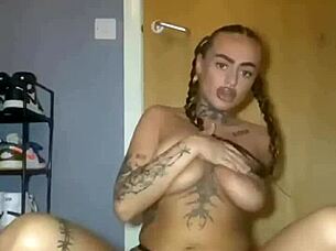 Scottish tattooed girl fingers intensely in private moment