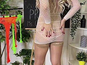 Sexy mature in fishnets teases with curvy ass and big tits!