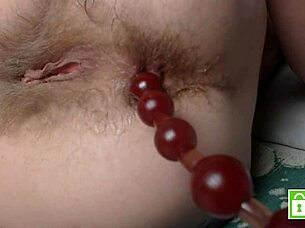 pushing anal beads hands-free from hairy asshole!