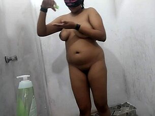 busty brunette soaps her dirty milf pussy in steamy bath