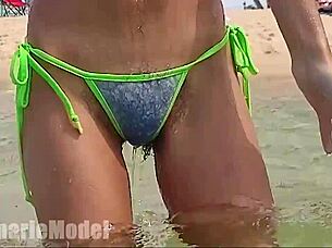 Skinny latina flashes hairy wet pussy underwater publicly